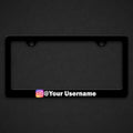 Black plate frame with the Instagram icon and @Your Username in white along the bottom