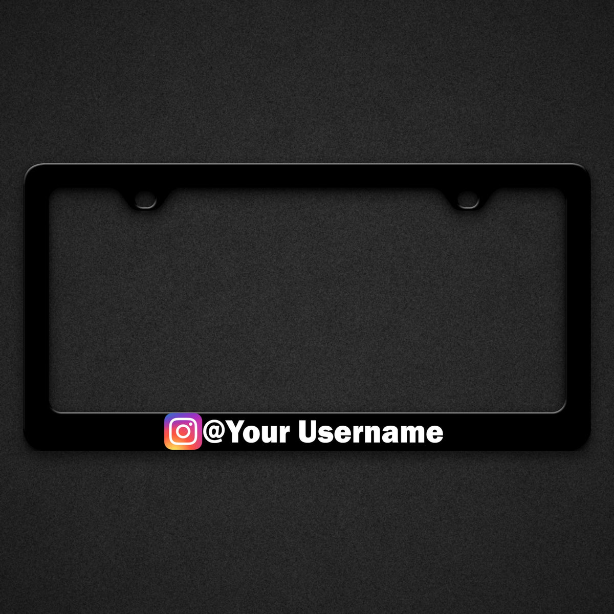Black plate frame with the Instagram icon and @Your Username in white along the bottom